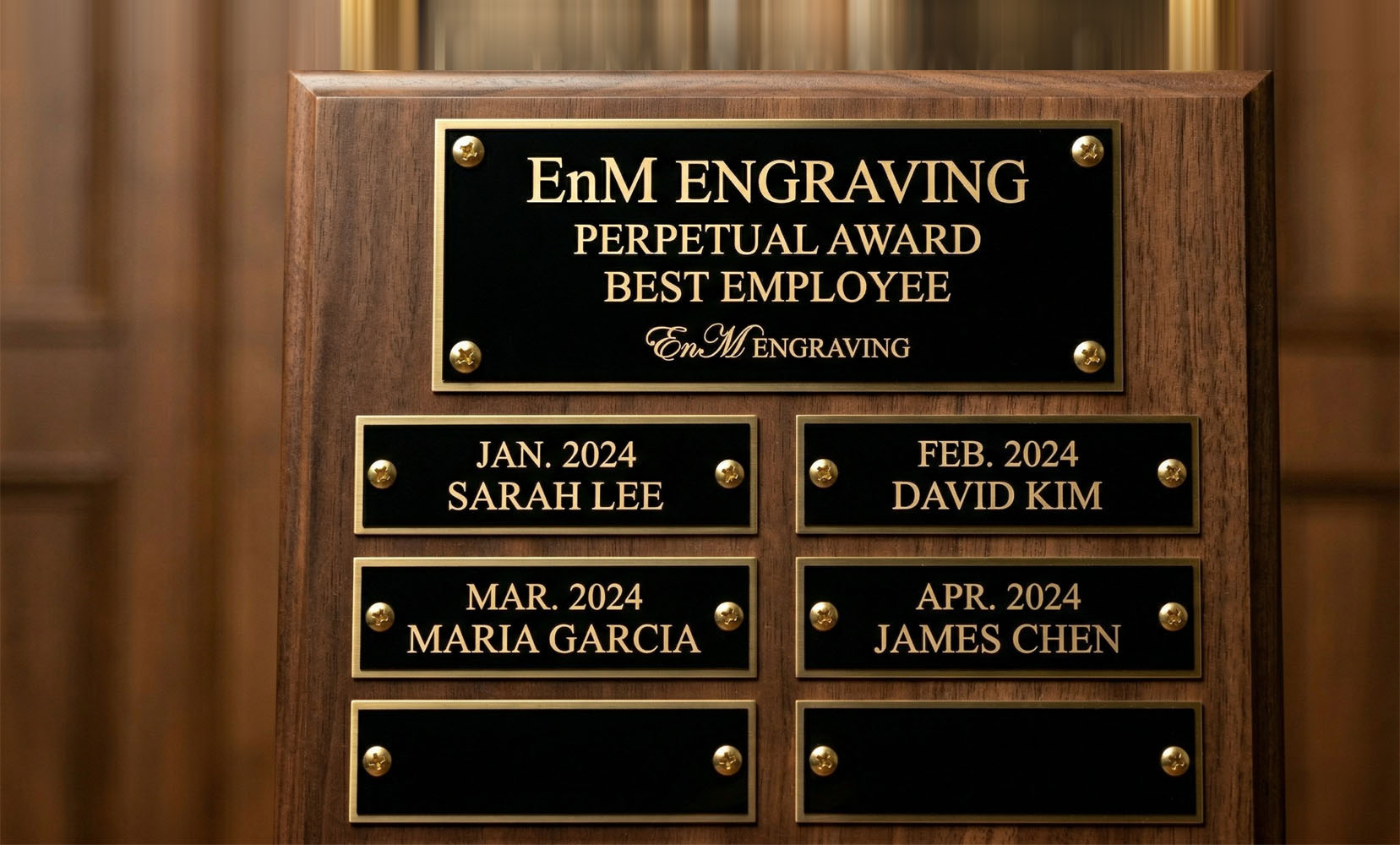 Perpetual plaque with engraved names and dates to recognize best employees, featuring 'EnMEngraving' branding